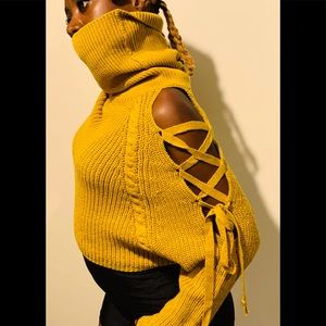 Gold Knit Slouch turtleneck with slit sleeves